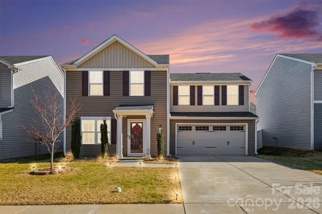 a view of a house with entertaining space