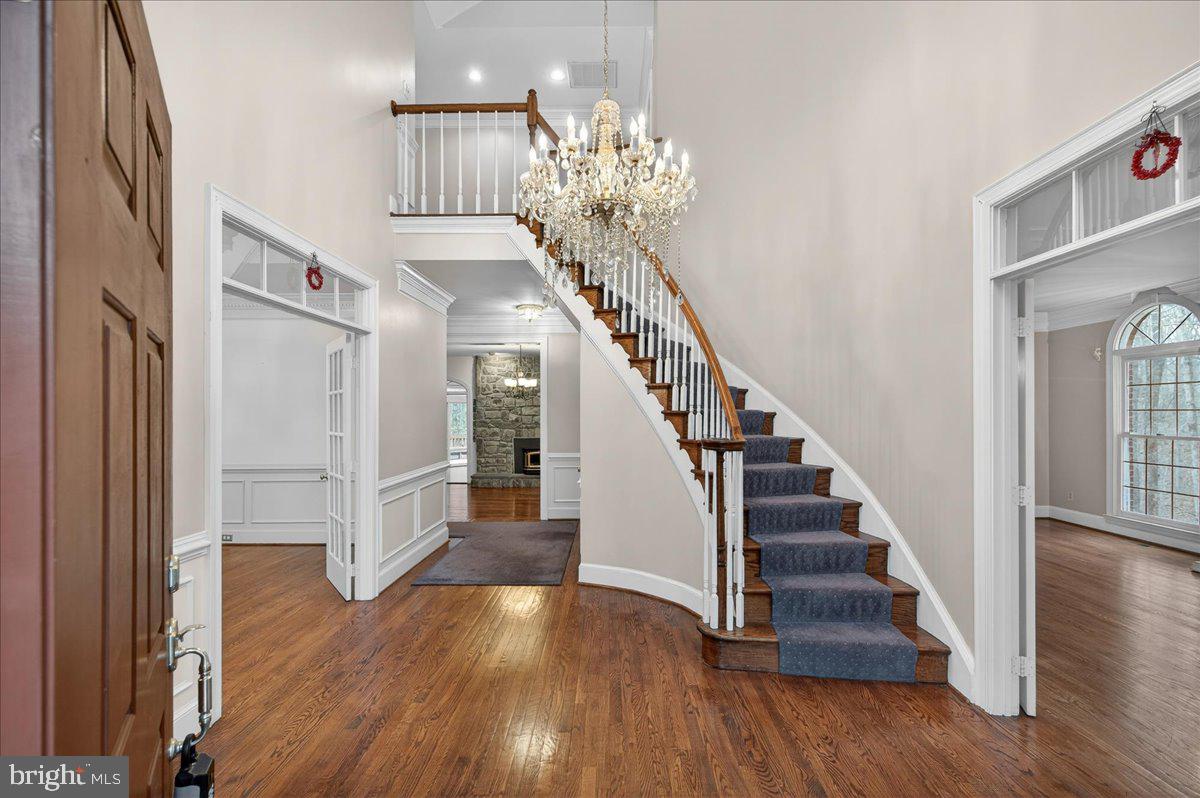 6612 Colchester Road Clifton, VA 20124 - Photo 7 of 93 Sweeping circular staircase