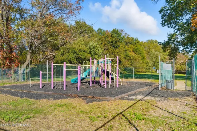 a view of a park with swings