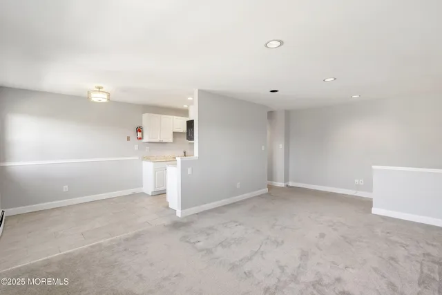 a view of a kitchen with a sink