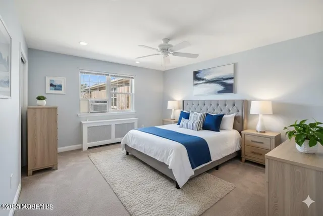 a bed room with a bed and a window