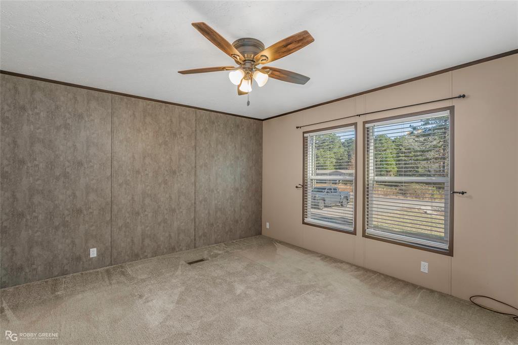 295 Cass Pvt Drive Gloster, LA 71030 - Photo 11 of 28 a view of an empty room with a window