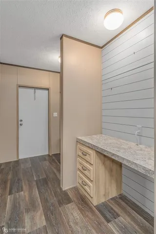 a view of a backyard with a garden