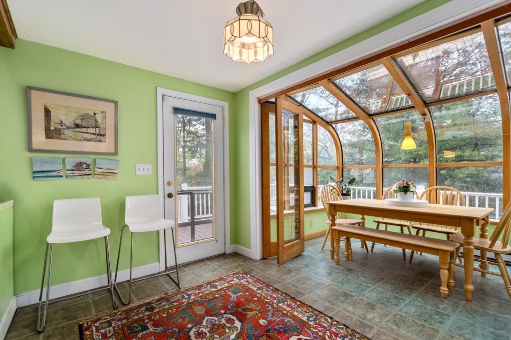 135 Tower Avenue Needham, MA 02494 - Photo 11 of 24 a living room with furniture and a large window
