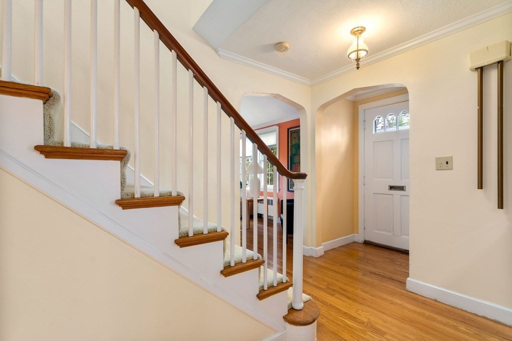 135 Tower Avenue Needham, MA 02494 - Photo 15 of 24 a view of entryway and hall with wooden floor
