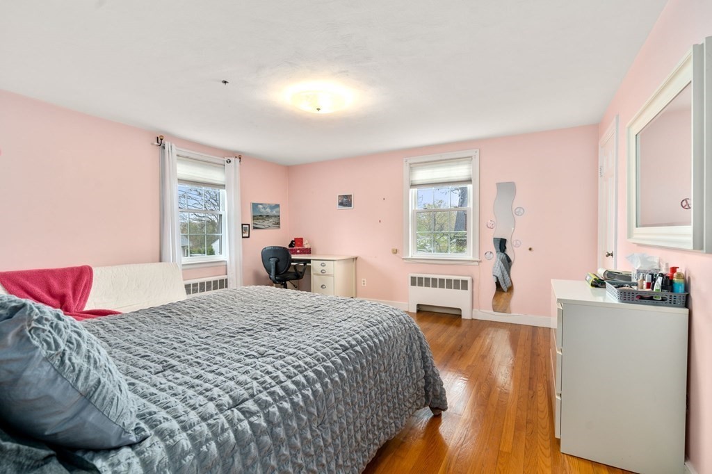 135 Tower Avenue Needham, MA 02494 - Photo 16 of 24 a bedroom with a large bed and a window