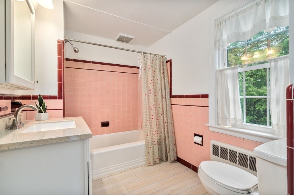135 Tower Avenue Needham, MA 02494 - Photo 19 of 24 a bathroom with a sink toilet and shower