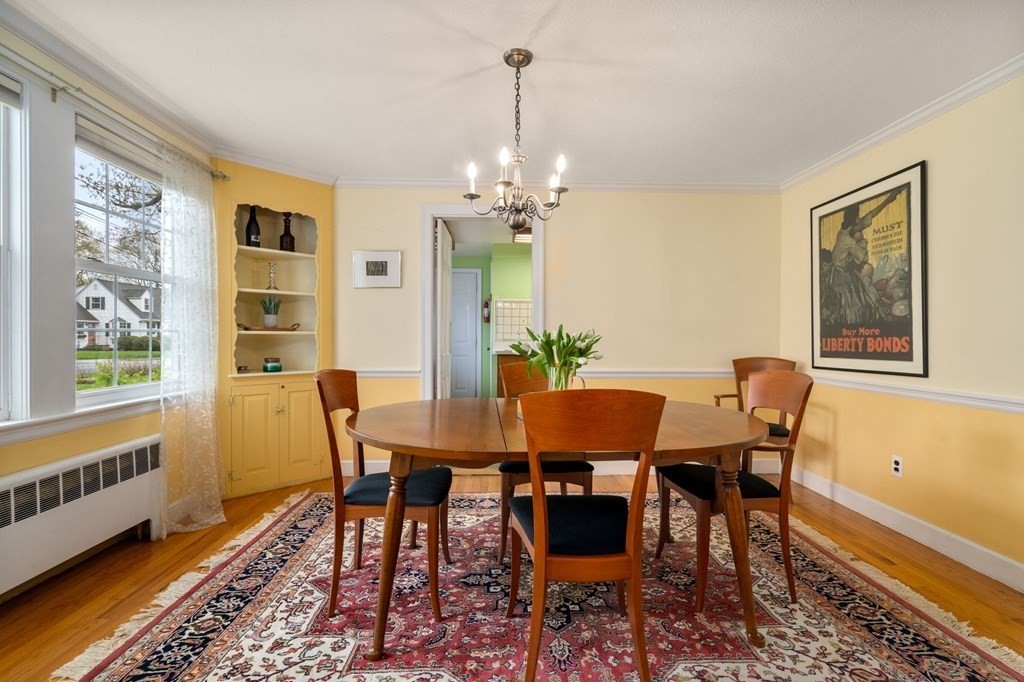 135 Tower Avenue Needham, MA 02494 - Photo 3 of 24 a view of a dining room with furniture window and wooden floor