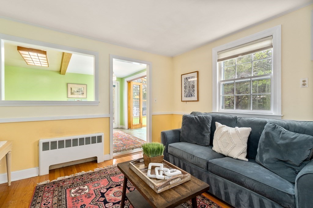 135 Tower Avenue Needham, MA 02494 - Photo 7 of 24 a living room with furniture and a window