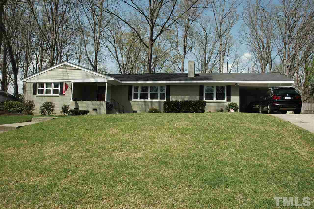 716 Currituck Drive Raleigh, NC 27609 - Photo 2 of 19 Lovely backyard, beautiful grass & fully landscaped. Outside amenities include shed with electricity, patio, deck,covered porch, fence, trailer gate, & more.