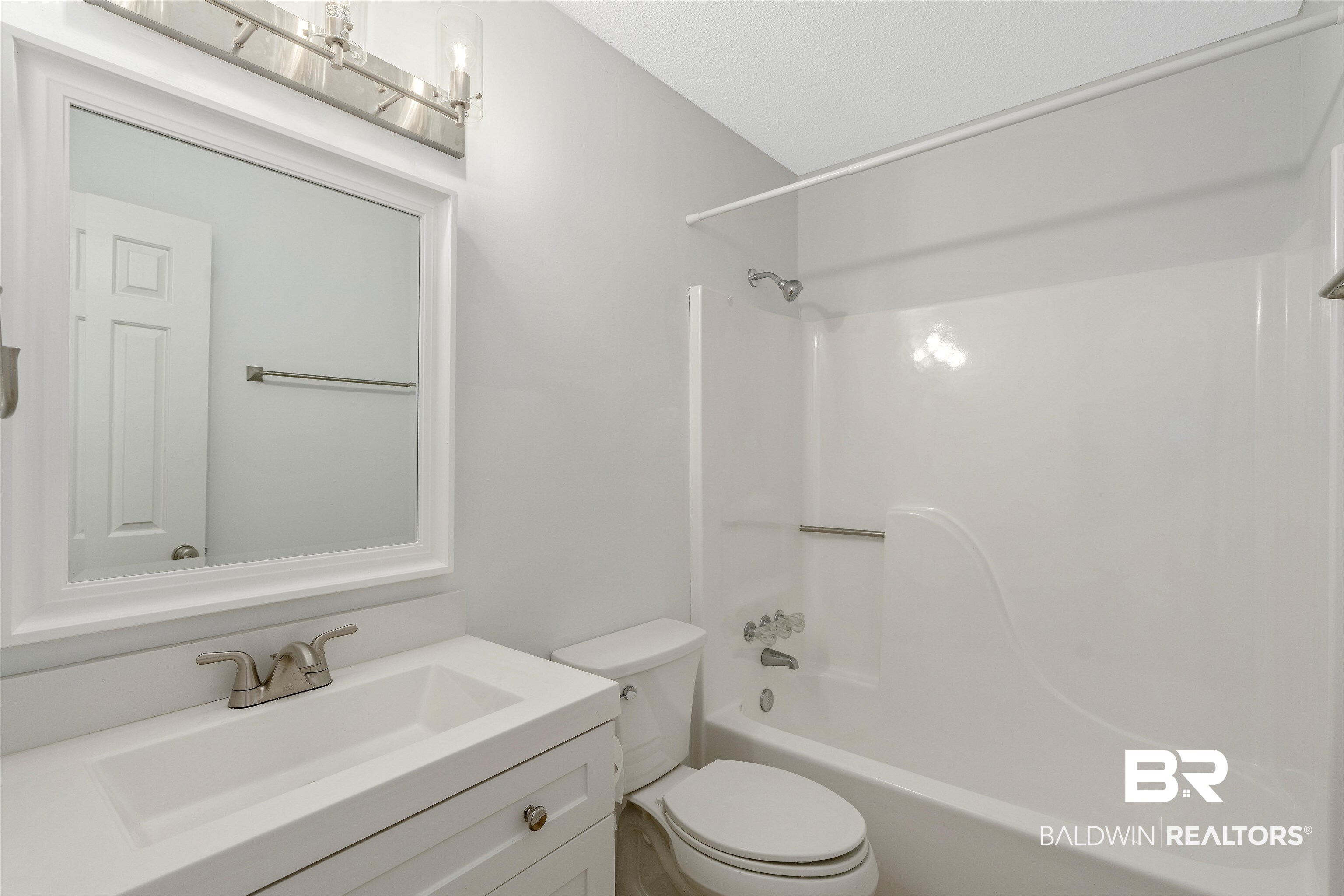 1701 Regency Road, Unit 120 Gulf Shores, AL 36542 - Photo 21 of 33 Full bathroom with vanity and shower / washtub combination
