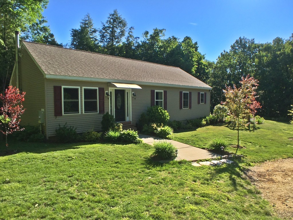 270 Main Road Chesterfield, MA 01012 - Photo 30 of 30 a front view of a house with garden