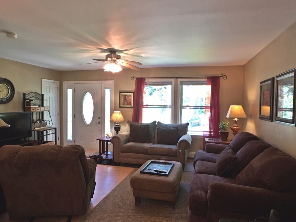 270 Main Road Chesterfield, MA 01012 - Photo 10 of 30 a living room with furniture and a large window