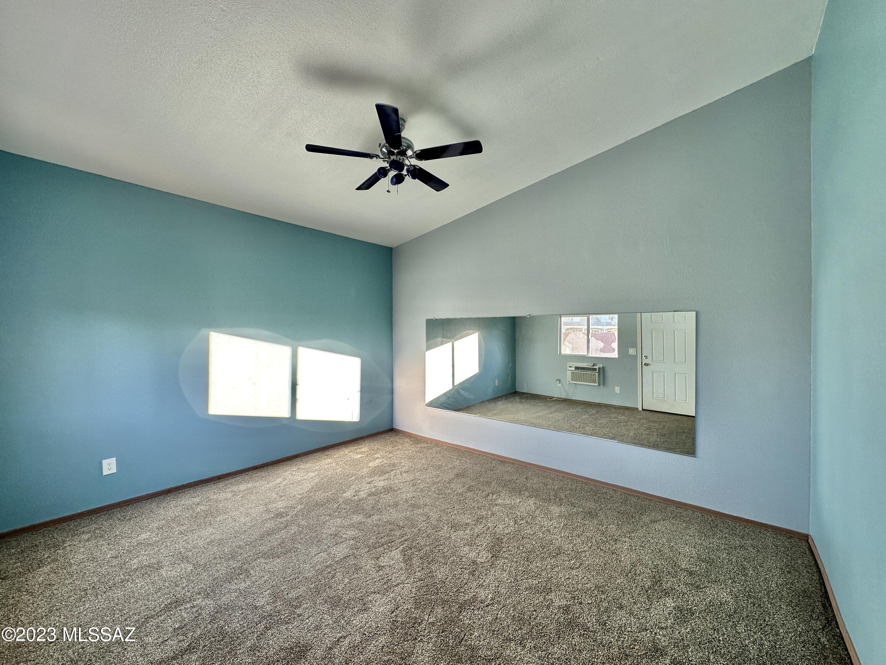 508 Eagle Meadow Loop Thatcher, AZ 85552 - Photo 29 of 32 a view of a livingroom with a ceiling fan and window