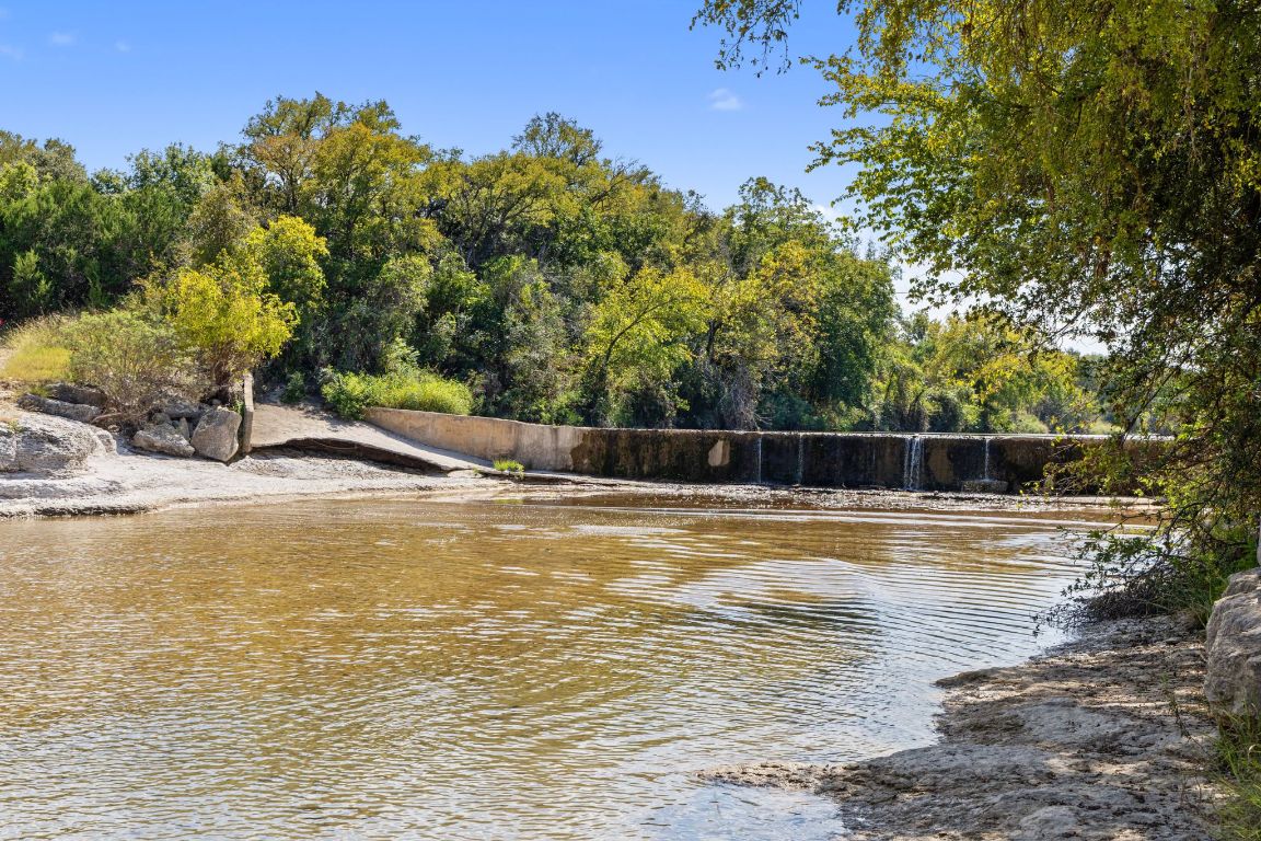 963 F-M 963 Briggs, TX 78608 - Photo 8 of 40 a view of a swimming pool with a yard