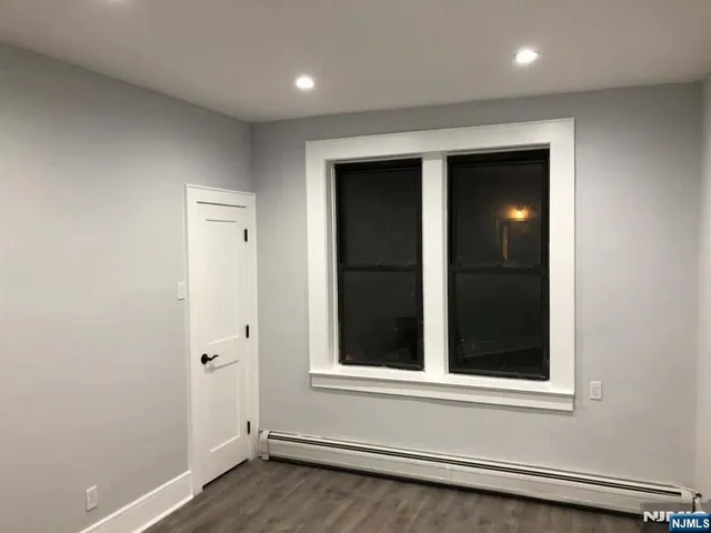 wooden floor and window in a room