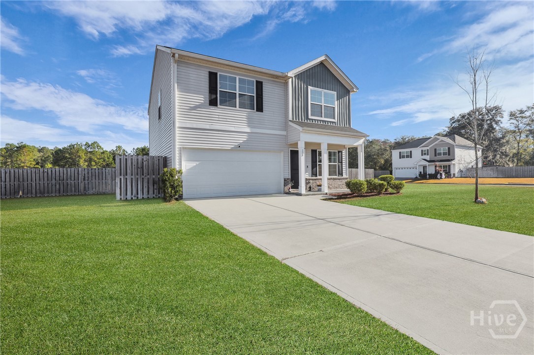 233 Caroline Way Guyton, GA 31312 - Photo 3 of 55 Grass has been enhanced