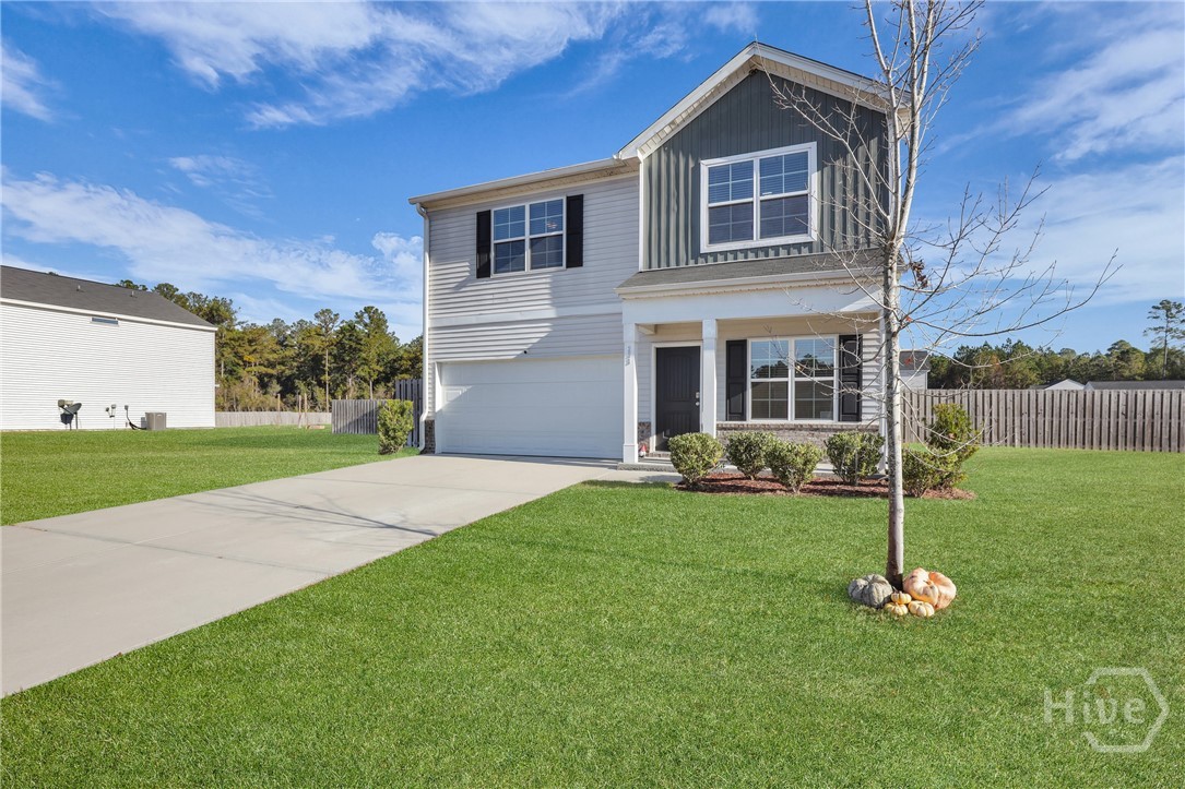 233 Caroline Way Guyton, GA 31312 - Photo 5 of 55 Grass has been enhanced