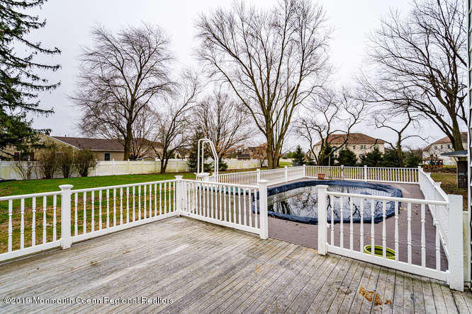 801 Adelphia Road Freehold, NJ 07728 - Photo 12 of 43 a view of street with wooden deck and trees