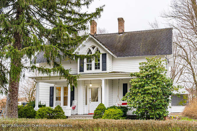 801 Adelphia Road Freehold, NJ 07728 - Photo 3 of 43 a front view of a house with garden