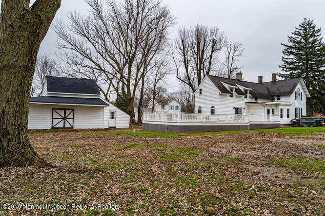 801 Adelphia Road Freehold, NJ 07728 - Photo 8 of 43 a view of a house with a yard