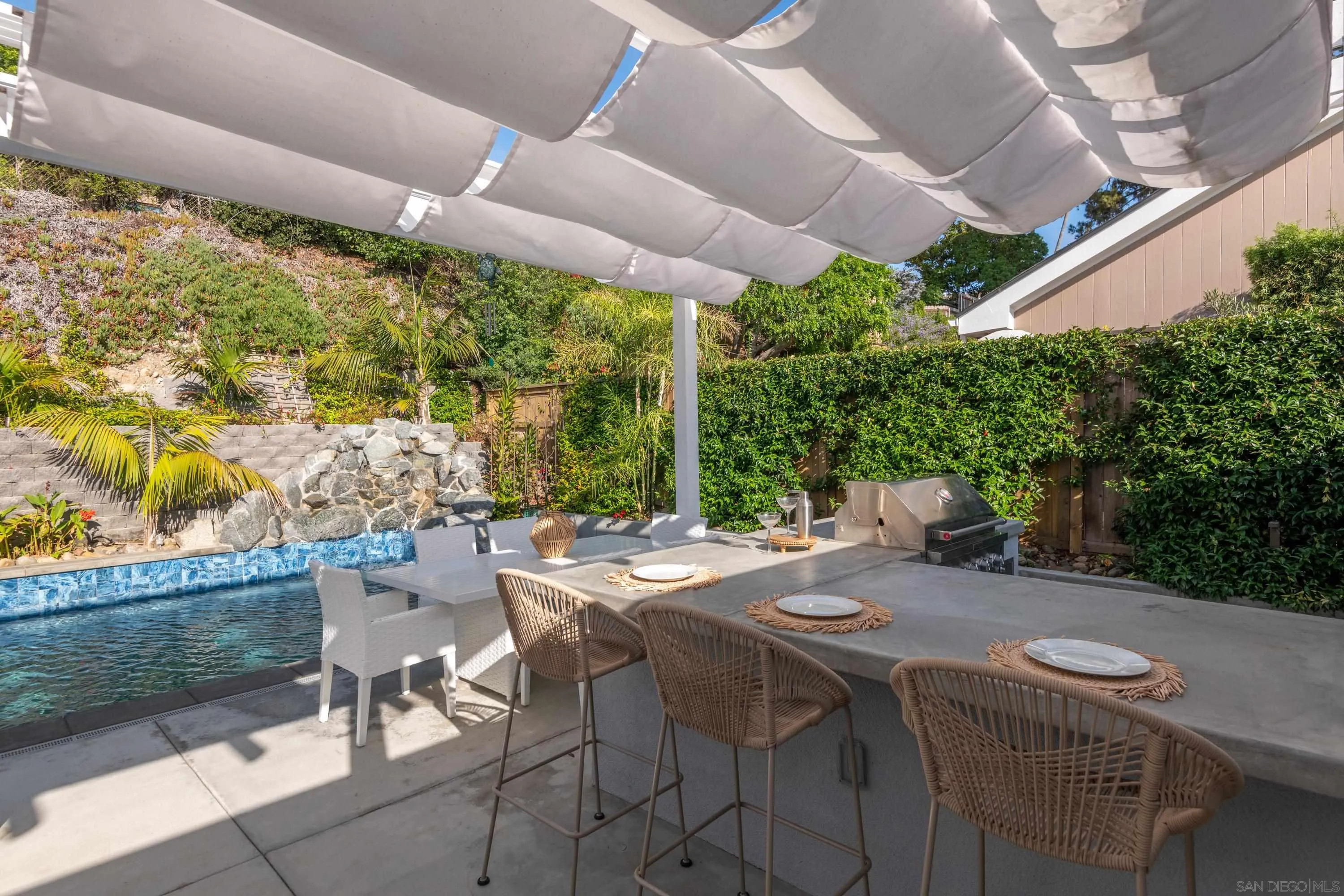 6529 Manana Place La Jolla, CA 92037 - Photo 26 of 36 a view of an outdoor space with a table and chairs