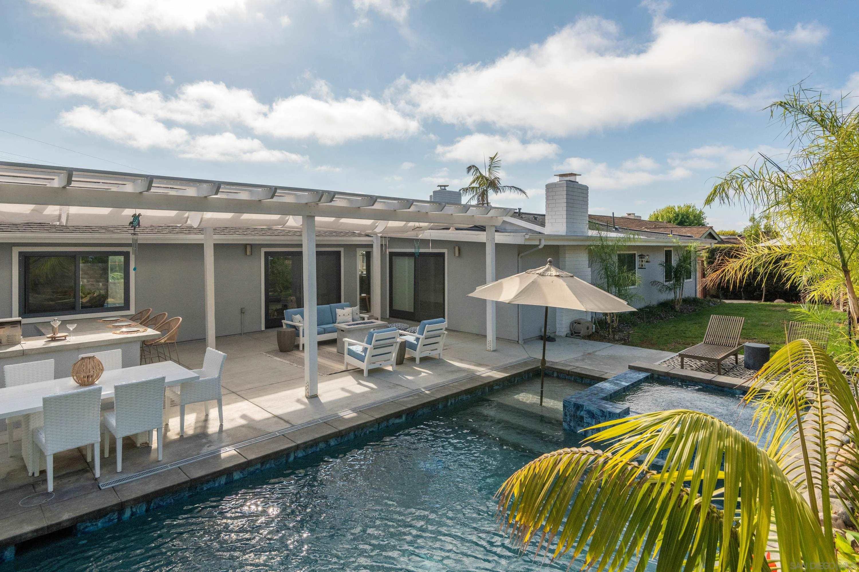 6529 Manana Place La Jolla, CA 92037 - Photo 29 of 36 a swimming pool with outdoor seating yard and barbeque oven
