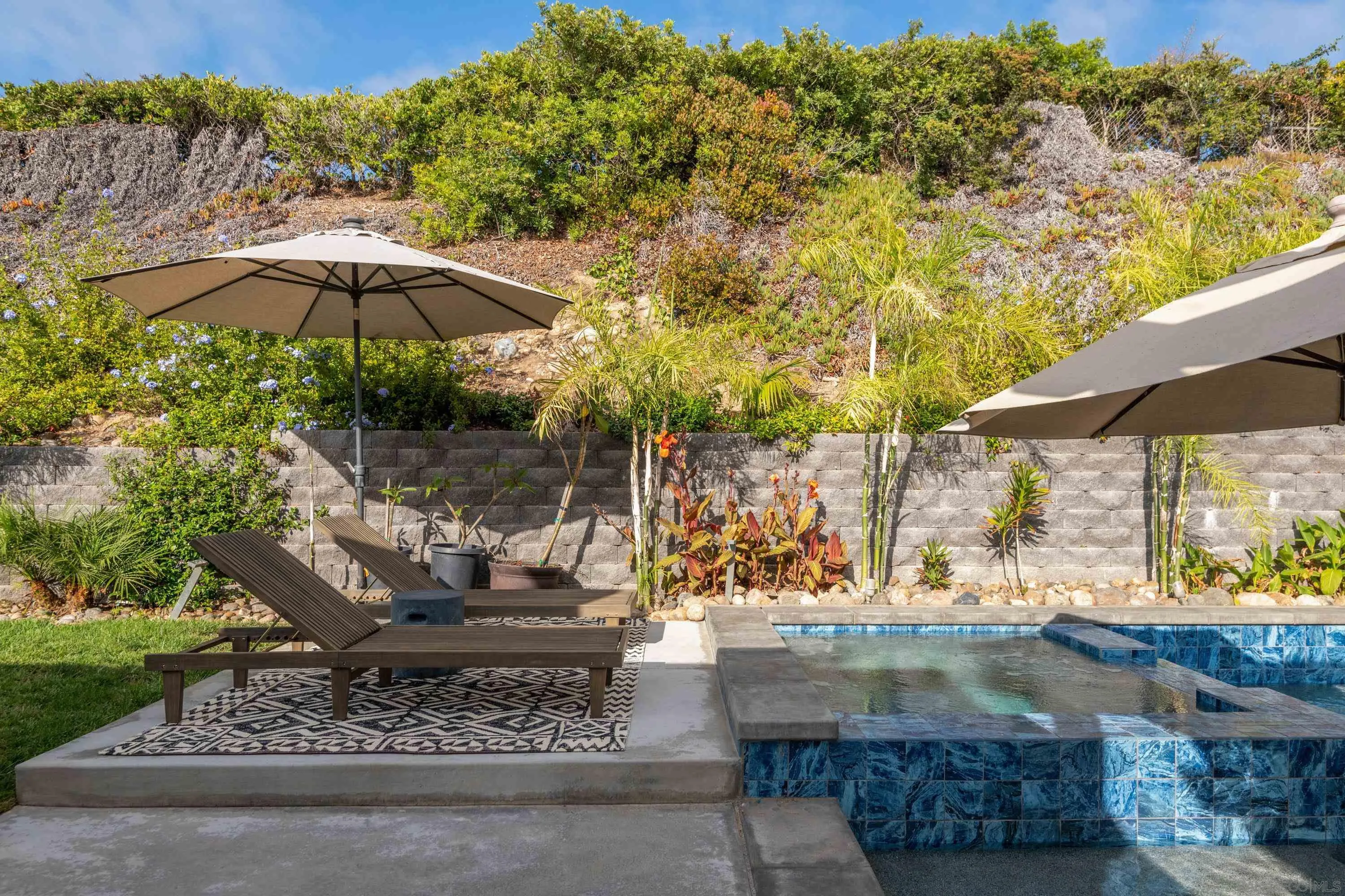 6529 Manana Place La Jolla, CA 92037 - Photo 32 of 36 a view of a yard with an umbrella