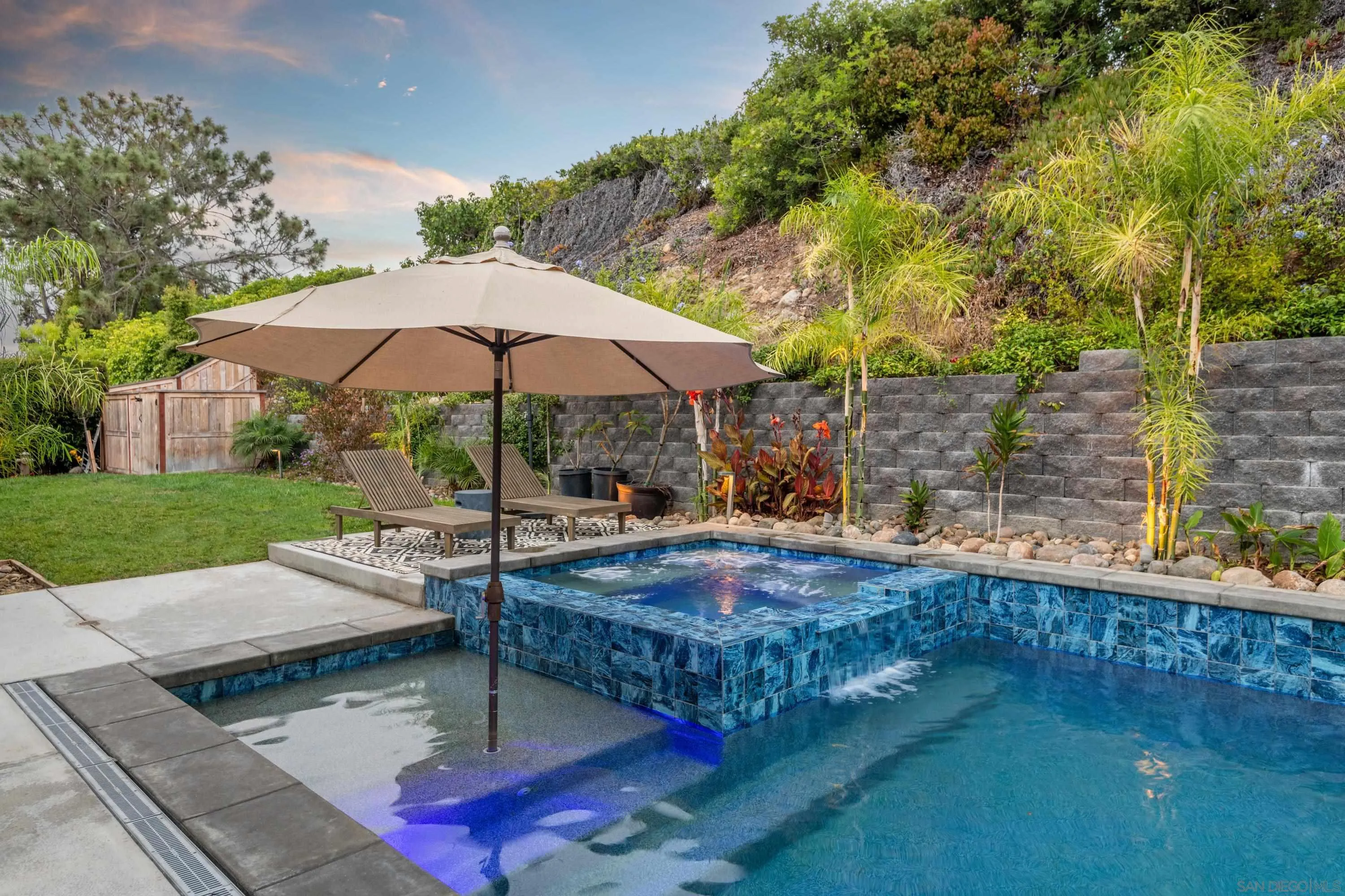 6529 Manana Place La Jolla, CA 92037 - Photo 34 of 36 a view of backyard with swimming pool and patio