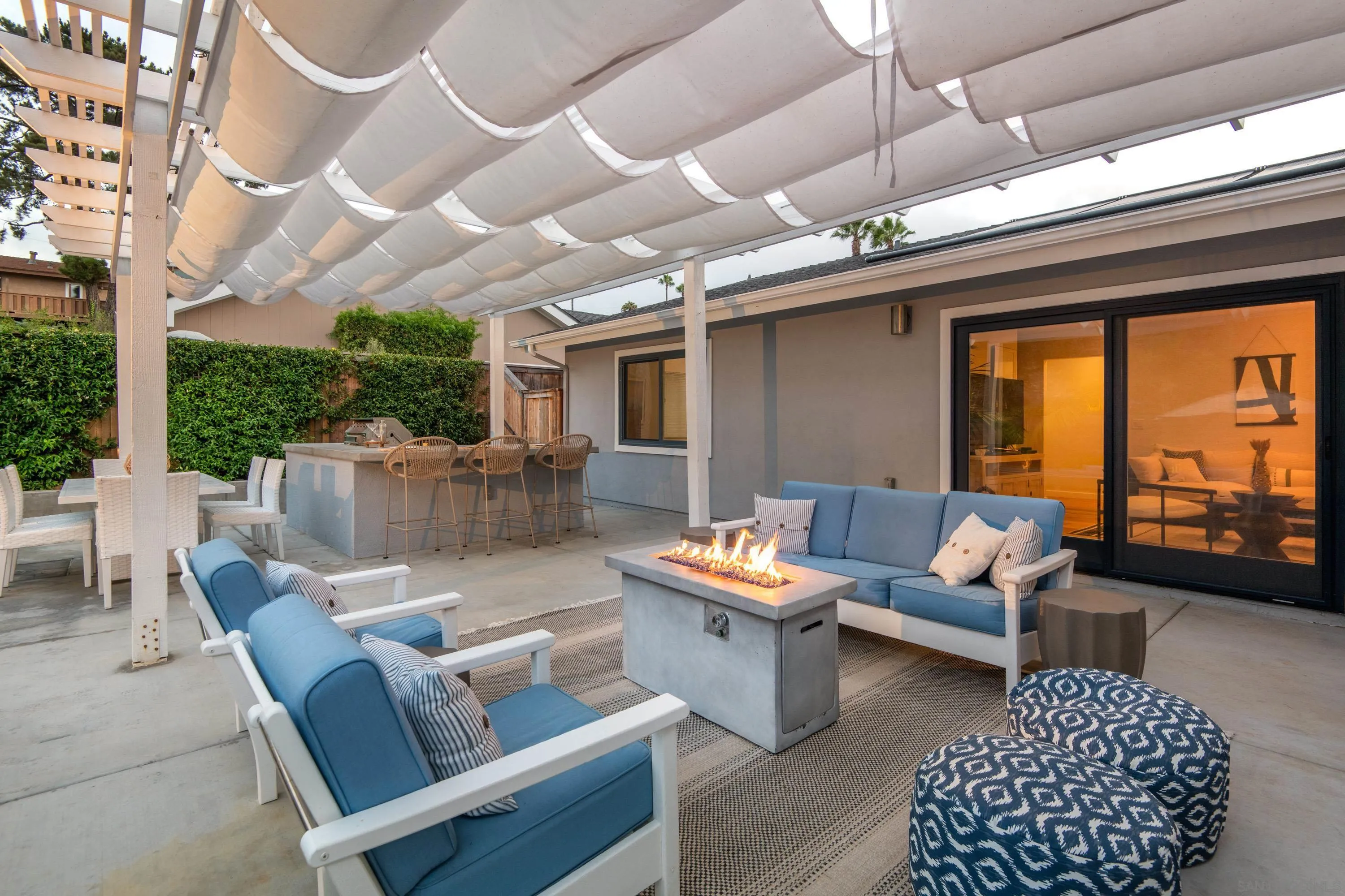 6529 Manana Place La Jolla, CA 92037 - Photo 36 of 36 a outdoor space with patio fireplace and outdoor seating
