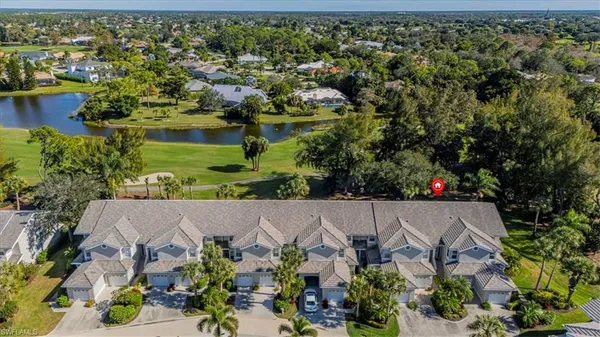 an aerial view of a house with a garden