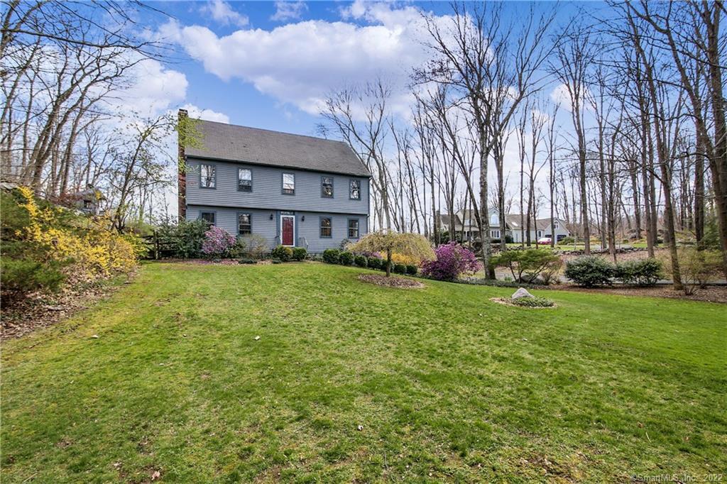 35 Cold Spring Road Newtown, CT 06470 - Photo 1 of 1 a view of a house with a back yard