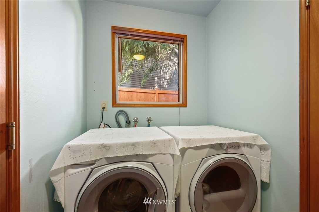 5030 Northeast 21st Street Renton, WA 98059 - Photo 12 of 27 a utility room with dryer and washer