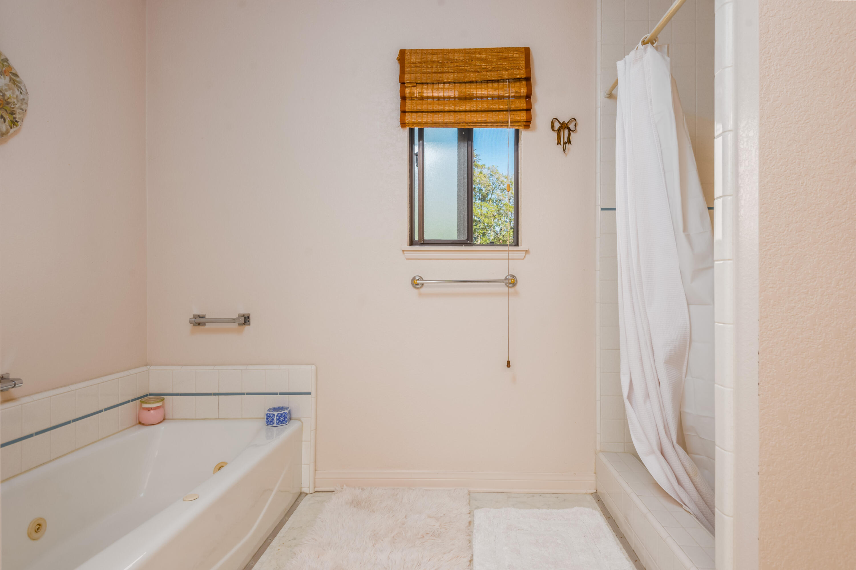 Undisclosed Address Santa Barbara, CA 93110 - Photo 12 of 12 a bathroom with a tub and shower