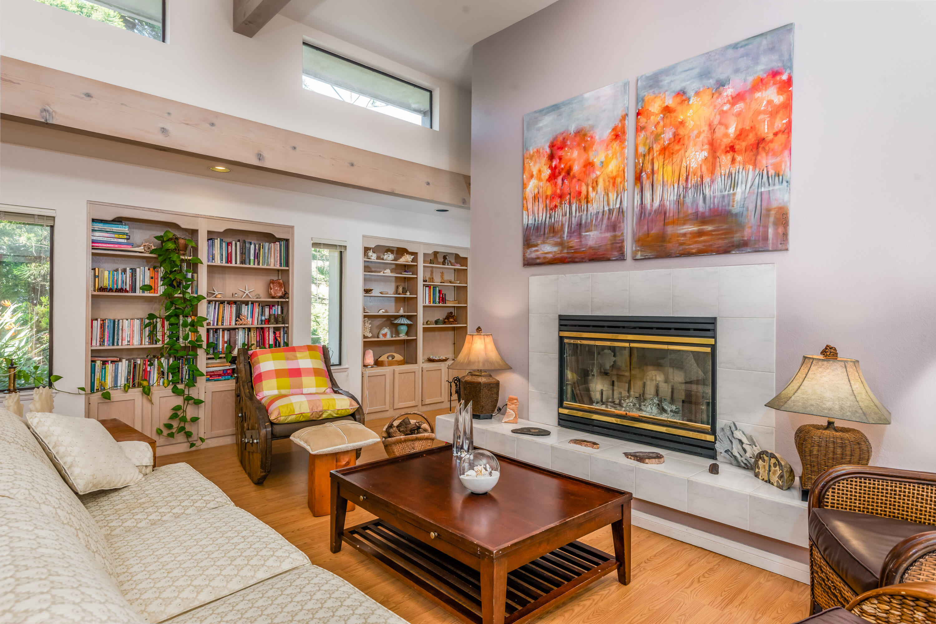 Undisclosed Address Santa Barbara, CA 93110 - Photo 4 of 12 a living room with furniture a fireplace and a large window