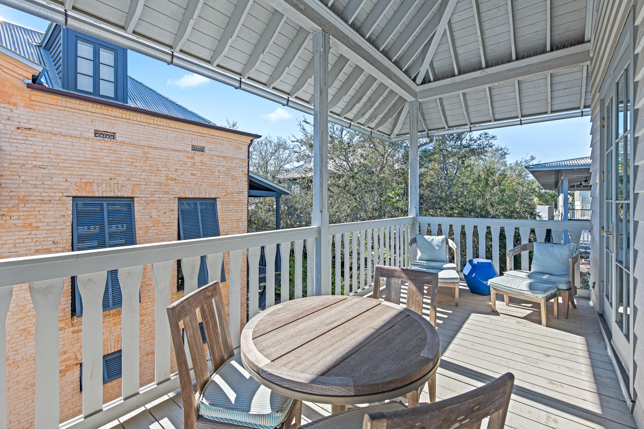 188 Round Road Inlet Beach, FL 32461 - Photo 85 of 98 a view of a chair and tables in the balcony