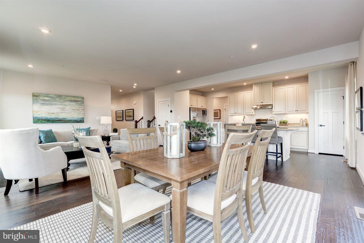 1258 Upper Patuxent Ridge Road Odenton, MD 21113 - Photo 8 of 23 a view of a dining room with furniture