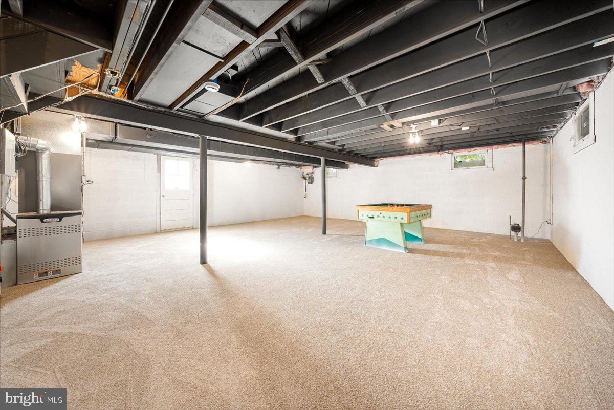 8211 Burnley Road Towson, MD 21204 - Photo 28 of 33 Painted and carpeted "unfinished" basement