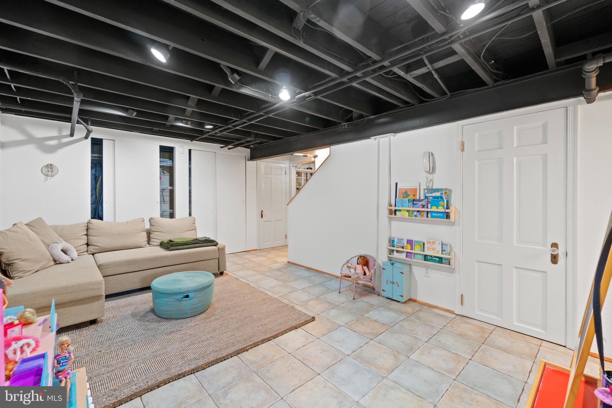 3205 Rittenhouse Street Northwest Washington, DC 20015 - Photo 28 of 40 Basement - Family room - Interior and rear entry