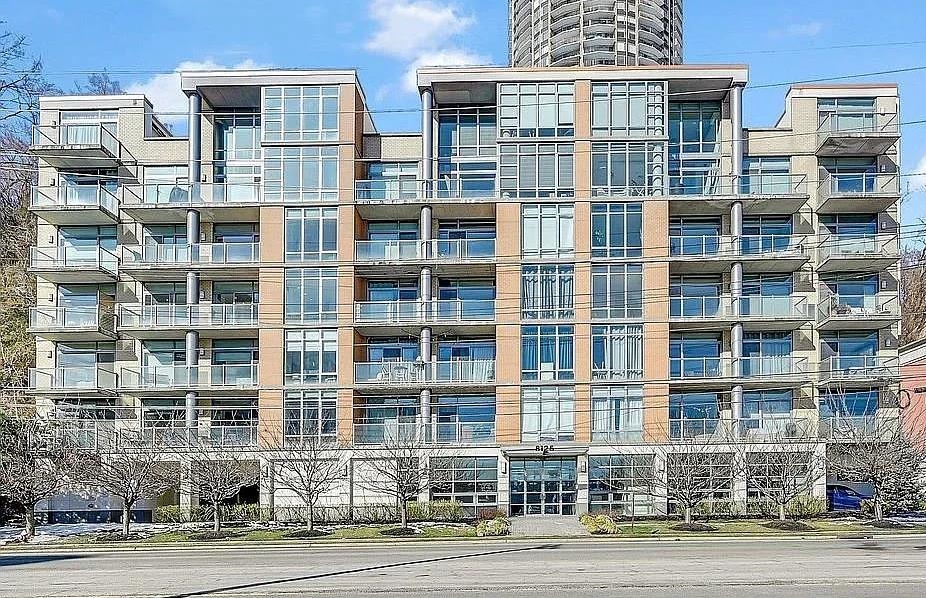 a front view of a building with a street