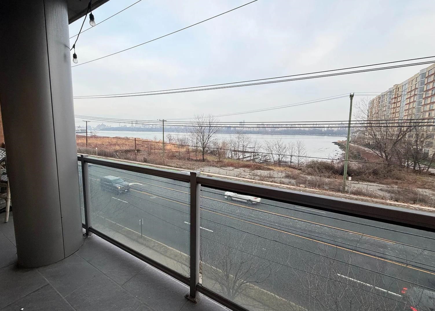 8125 River Road, Unit 3C North Bergen, NJ 07047 - Photo 18 of 23 a view of balcony with a sink and wooden floor