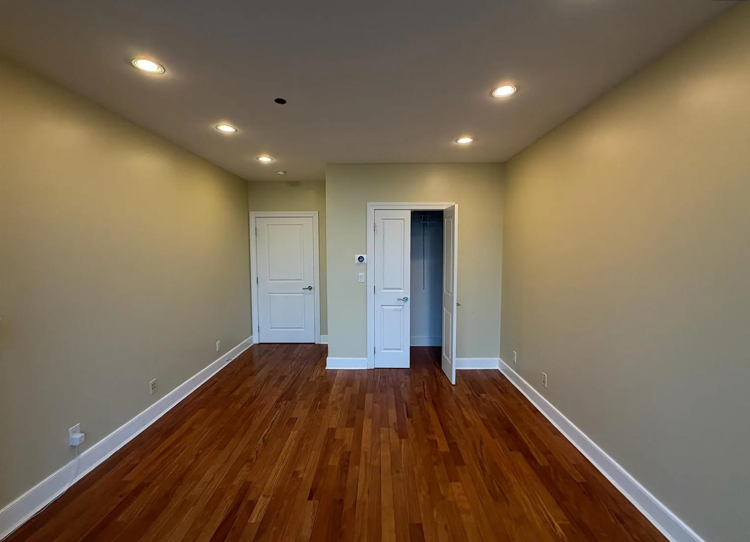 8125 River Road, Unit 3C North Bergen, NJ 07047 - Photo 8 of 23 a view of hallway with wooden floor