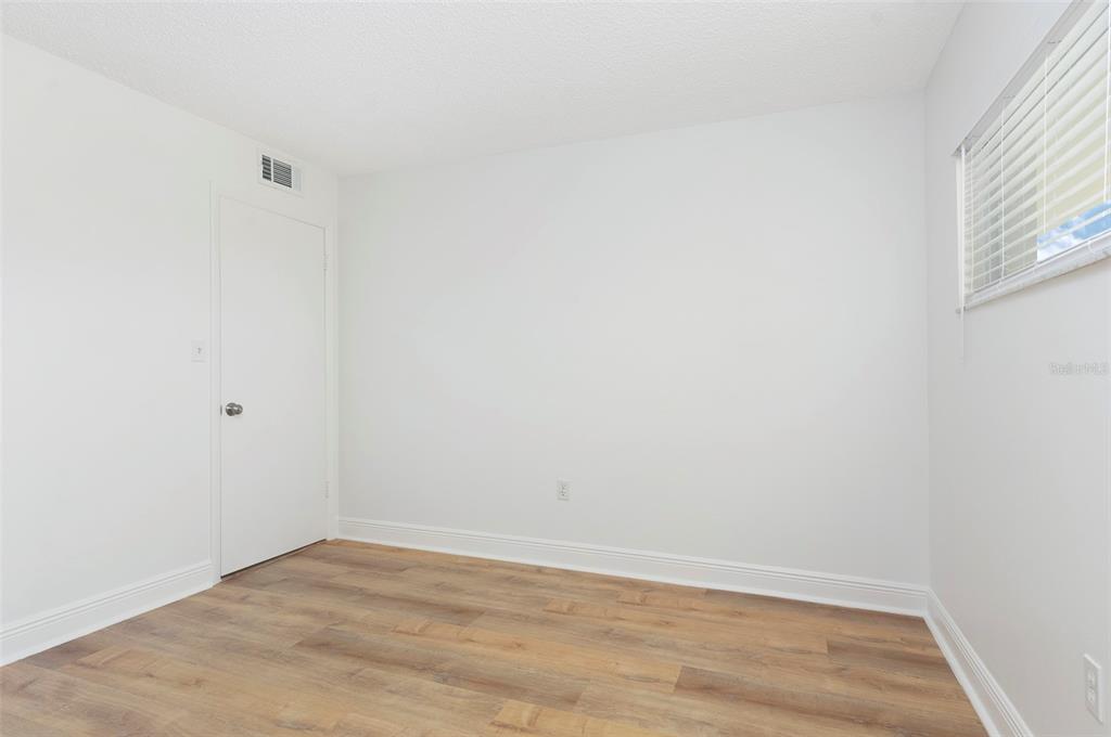 4725 Cove Circle, Unit 207 St. Petersburg, FL 33708 - Photo 15 of 46 a view of an empty room