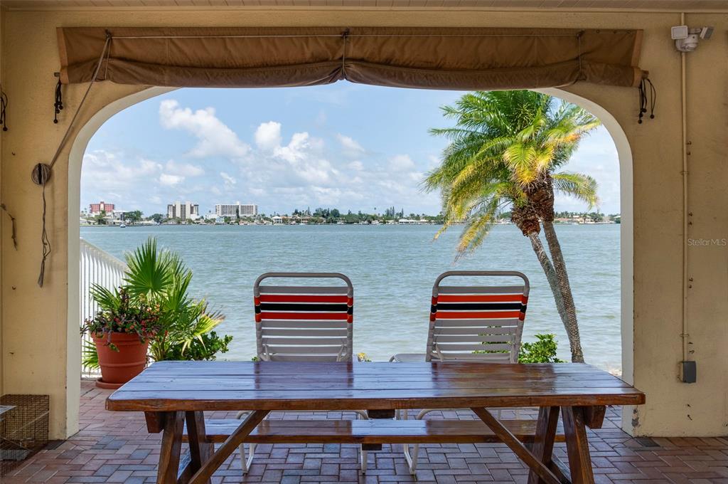 4725 Cove Circle, Unit 207 St. Petersburg, FL 33708 - Photo 31 of 46 a view of outdoor space with seating