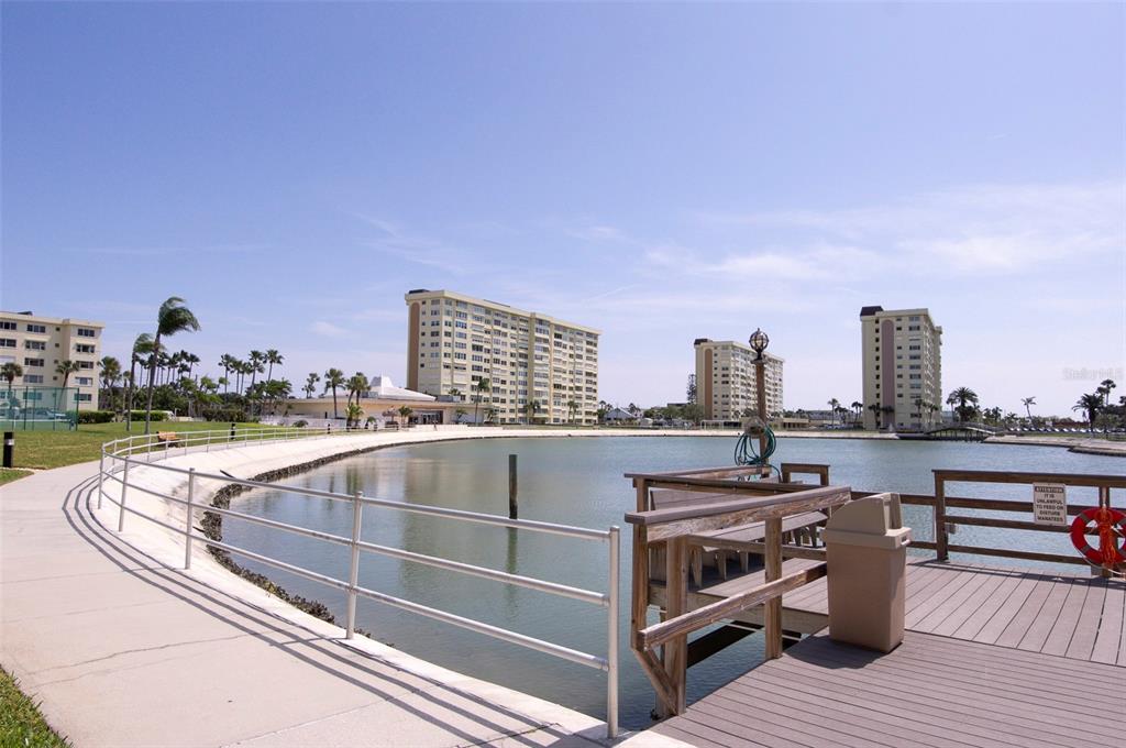 4725 Cove Circle, Unit 207 St. Petersburg, FL 33708 - Photo 35 of 46 a view of city from balcony