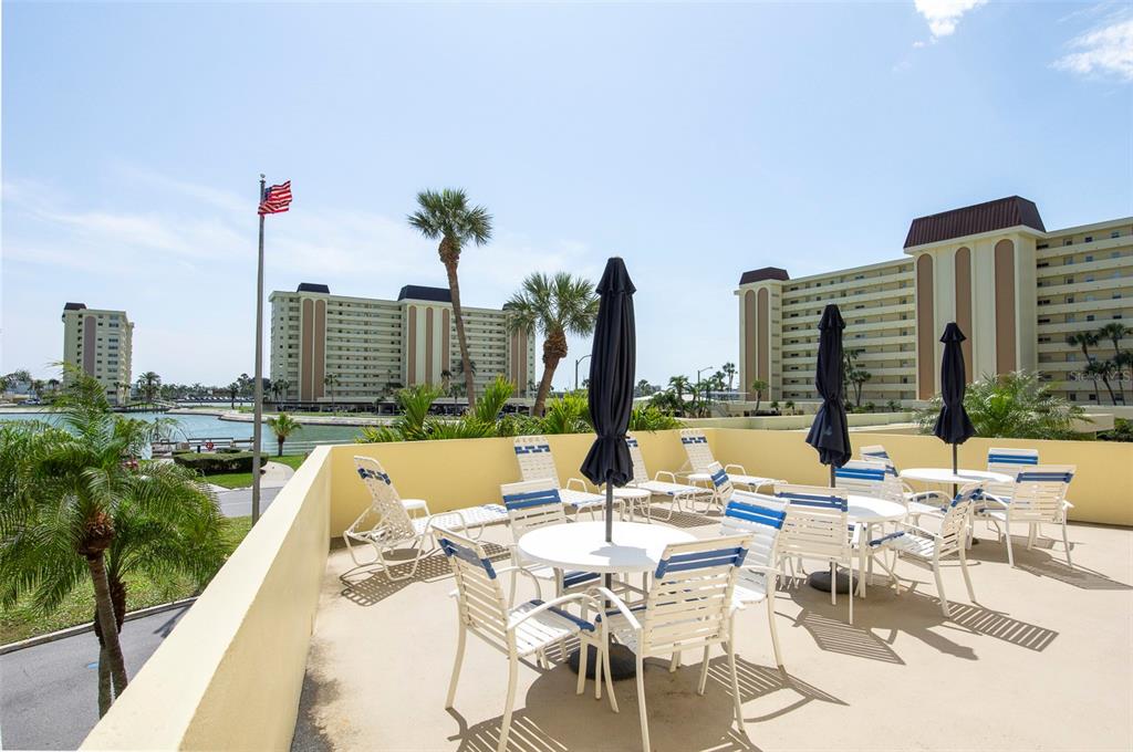 4725 Cove Circle, Unit 207 St. Petersburg, FL 33708 - Photo 41 of 46 a view of lake with city view