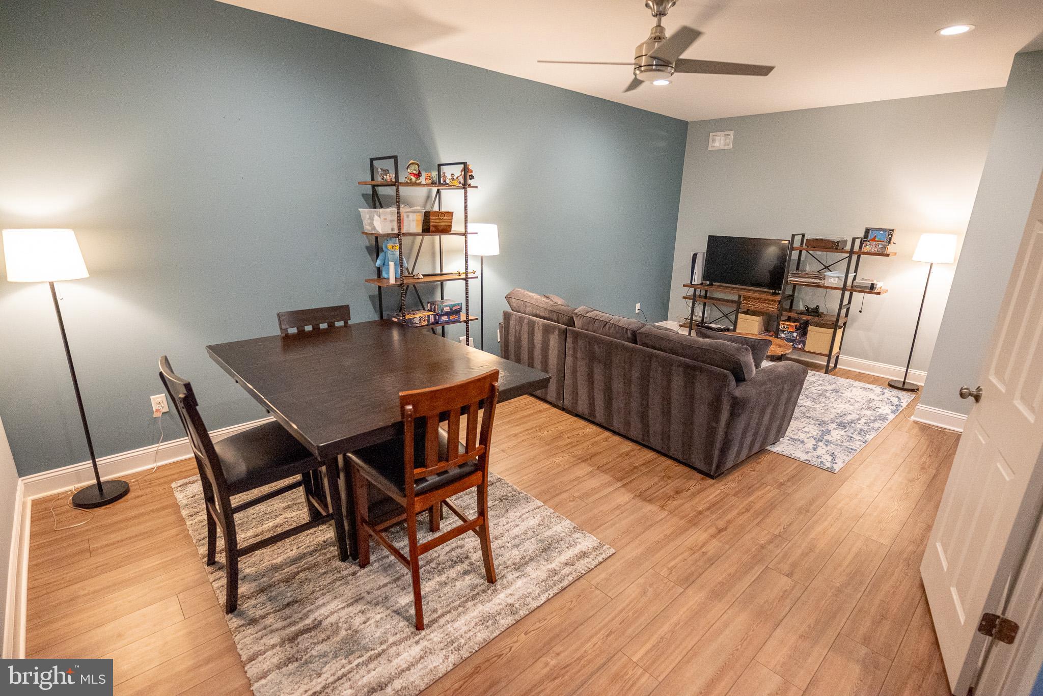210 Spring Lane West Chester, PA 19382 - Photo 33 of 49 a view of a dining room with furniture and wooden floor