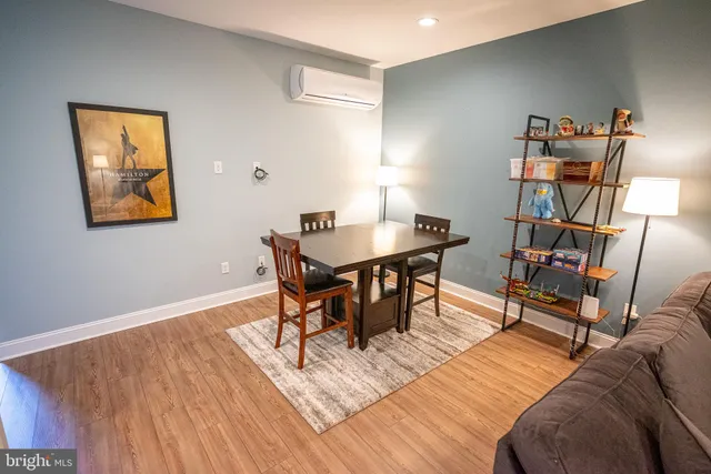 a bedroom with bed and a window