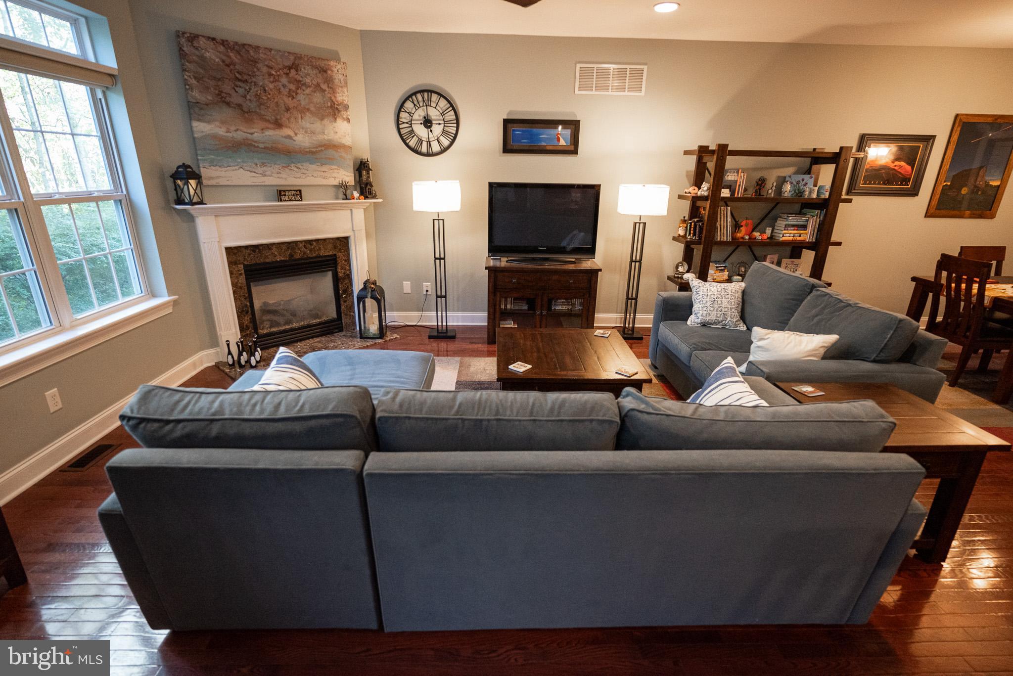 210 Spring Lane West Chester, PA 19382 - Photo 7 of 49 a living room with furniture and a flat screen tv