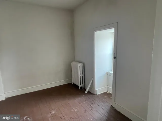 a utility room with cabinets dryer and washer